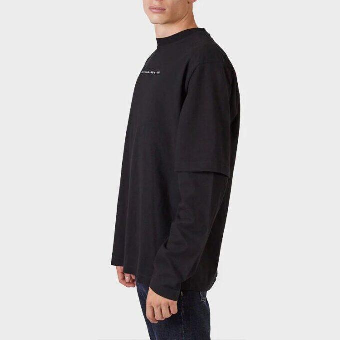 Camiseta negra holgada de manga larga con estampado de flecha verde en la manga de Off-White para hombre, colección FW21