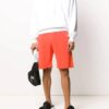 Pantalones deportivos para hombre FW20 con flechas rociadas, color naranja