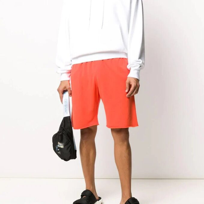 Pantalones deportivos para hombre FW20 con flechas rociadas, color naranja