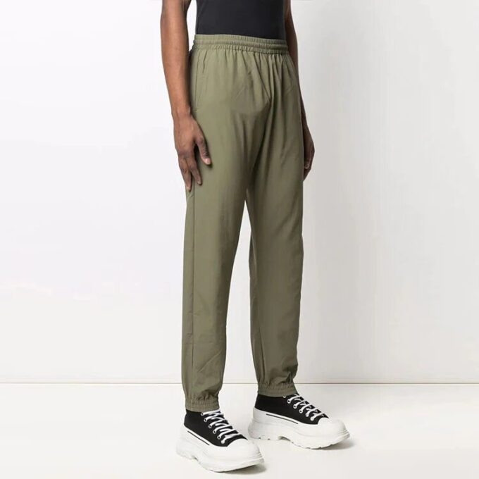 Pantalones largos casuales con logo FW21, versión estándar, verde oscuro