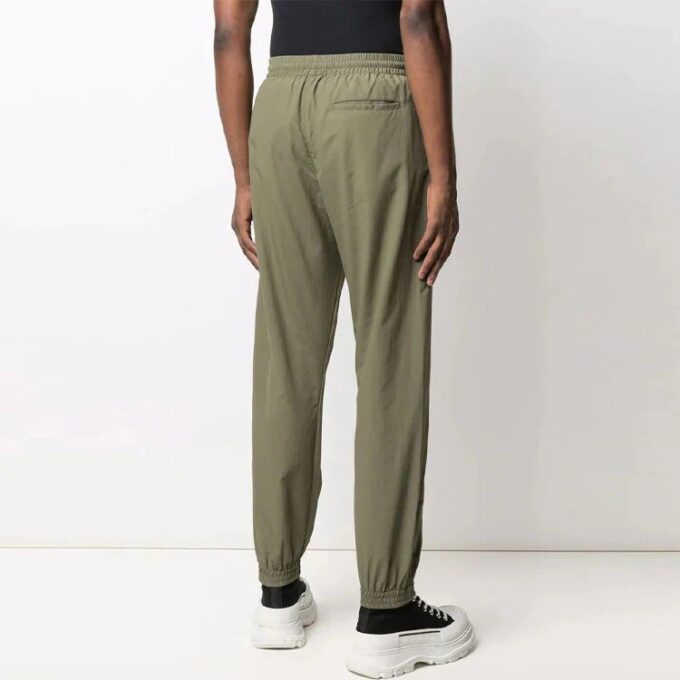 Pantalones largos casuales con logo FW21, versión estándar, verde oscuro