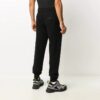 Pantalones largos casuales de color liso con cintura elástica para hombre de Off-White, color negro
