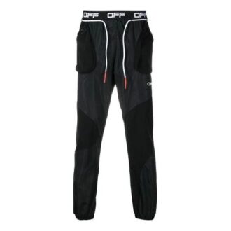 Pantalones largos deportivos ajustados con cordón y estampado de flecha del logotipo, color negro