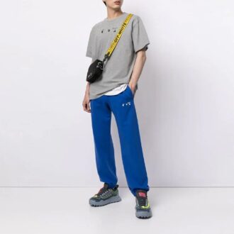 Pantalones largos deportivos de corte holgado con rayas SS21, color azul