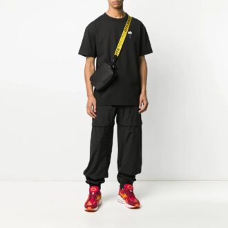 Pantalones largos deportivos holgados Arrows Bundle Feet, color negro